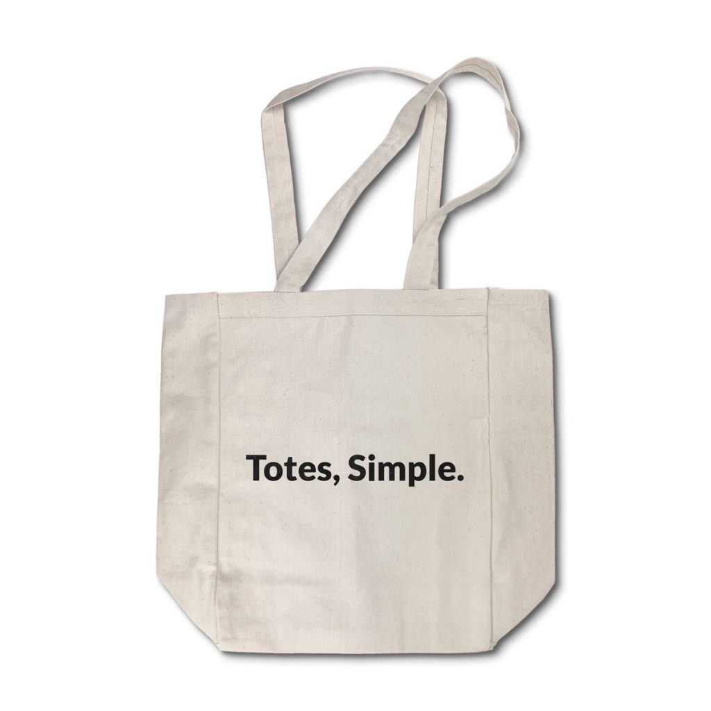 A Natural Heavy Cotton Tote with the words Totes, Simple screen printed on the surface.